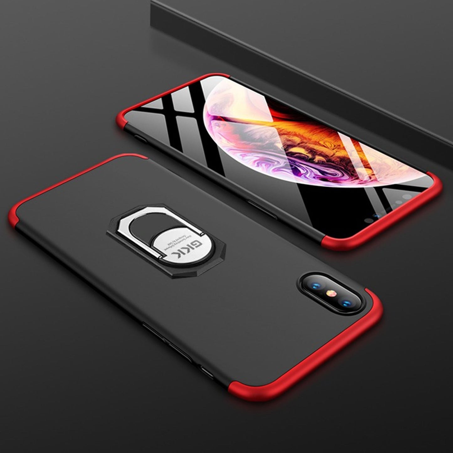 Black phone case with red accents and a ring holder on a dark surface